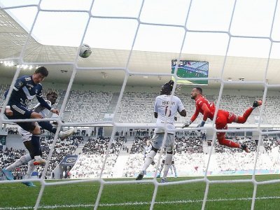 L'attaquant sud-coréen de Bordeaux  Hwang Ui-jo marque le 3e but à domicile contre Metz, lors de la 31e journée de Ligue 1, le 10 avril 2022 au Matmut Stadium - ROMAIN PERROCHEAU [AFP]