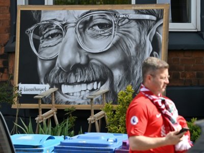 Une peinture murale à l'effigie de Jurgen Klopp, l'emblématique entraîneur de Liverpool, près du stade d'Anfield Road, le 24 avril 2022 à Liverpool - Paul ELLIS [AFP/Archives]