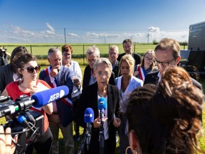La Première ministre Elisabeth Borne en campagne pour les législatives dans le Calvados le 21 mai 2022 - Sameer Al-DOUMY [AFP]