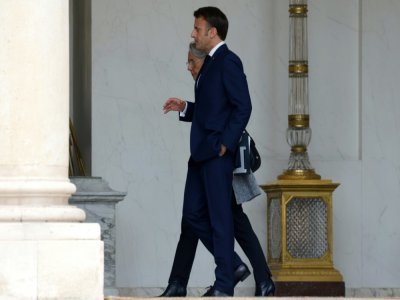 Emmanuel Macron avec sa Première ministre Elisabeth Borne à l'Elysée le 23 mai 2022 à Paris - Ludovic MARIN [AFP/Archives]
