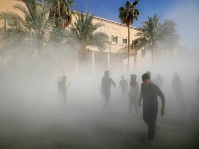 Des partisans du leader chiite Moqtada Sadr devant le siège du gouvernement dans la Zone verte de Bagdad, le 29 août 2022 en Irak - Ahmad Al-rubaye [AFP]