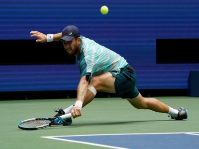 Le Français Corentin Moutet lors de son 8e de finale à l'US Open, perdu face au Norvégien Casper Ruud, le 4 septembre 2020 à New York - TIMOTHY A. CLARY [AFP]