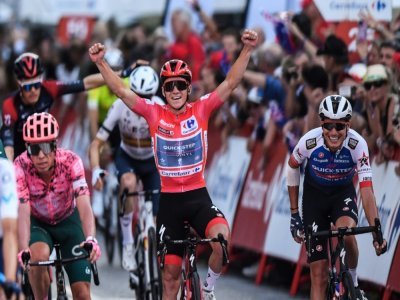 Le phénomène belge Remco Evenepoel remporte le Tour d'Espagne à l'issue de la dernière étape, le 11 septembre 2022 à Madrid - OSCAR DEL POZO [AFP]