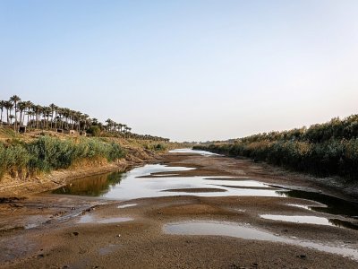 Confluent du fleuve Tigre, la rivière Dyala asséchée, dans le centre de l'Irak. Le 11 avril 2022 - Ayman HENNA [AFP]