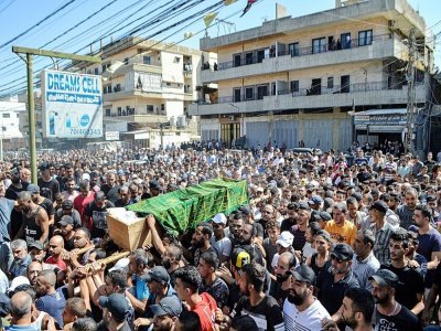 Les funérailles de migrants libanais, morts dans le naufrage de leur bateau au large des côtes syriennes, le 24 septembre 2022 à Tripoli, au Liban - Fathi AL-MASRI [AFP]