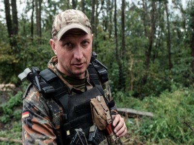 Le sergent ukrainien Roman Malyna lors d'un entretien avec l'AFP sur la ligne de front à Koupiansk (est de l'Ukraine), le 24 septembre 2022 - Yasuyoshi CHIBA [AFP]