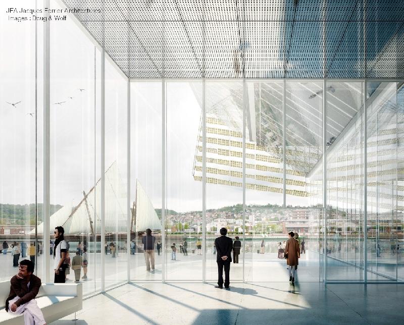 Le futur hall central, entouré de panneaux de verres. - Doug & Wolf